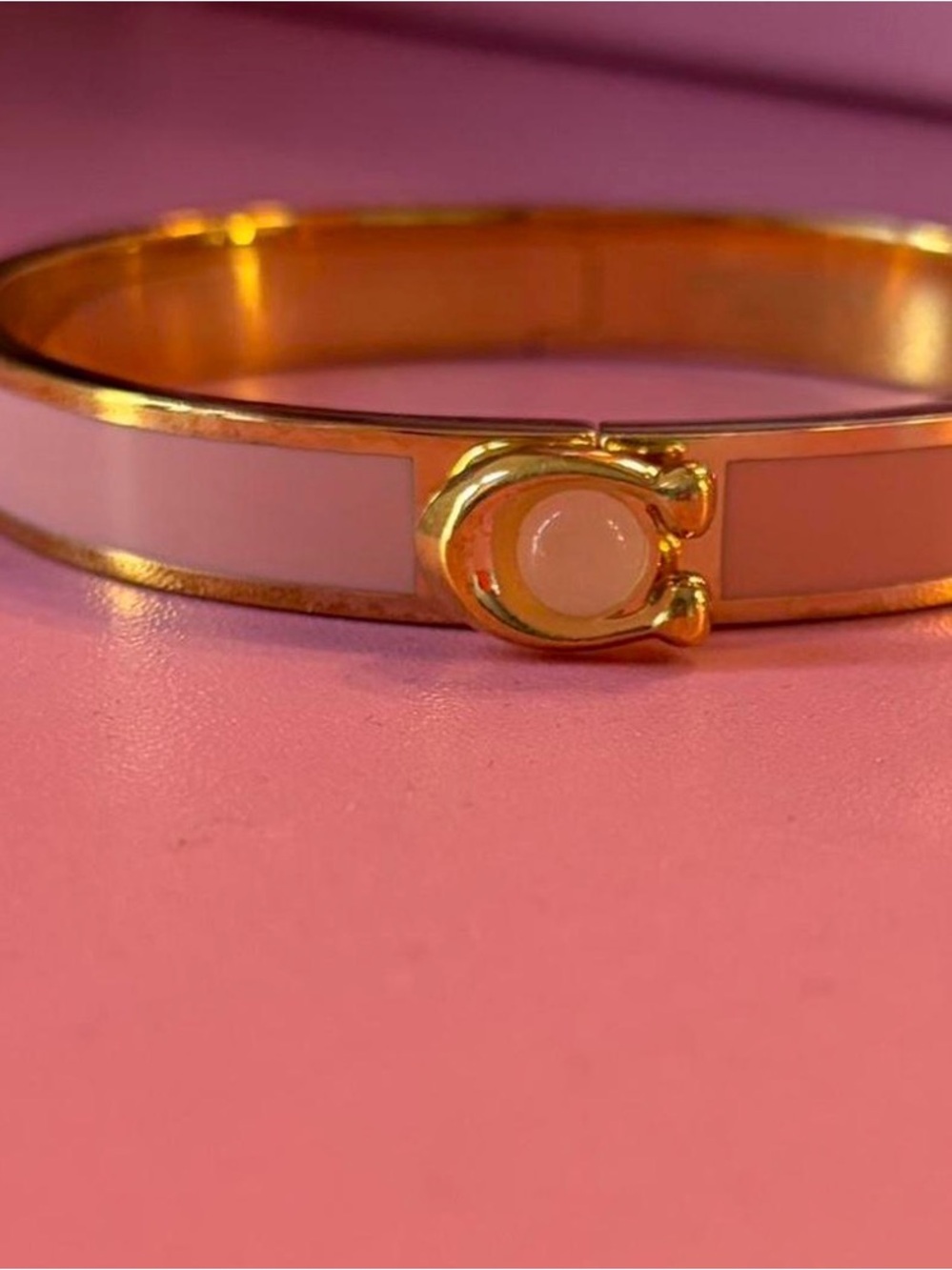 Coach Gold-Tone Pink Enamel Bangle Bracelet
